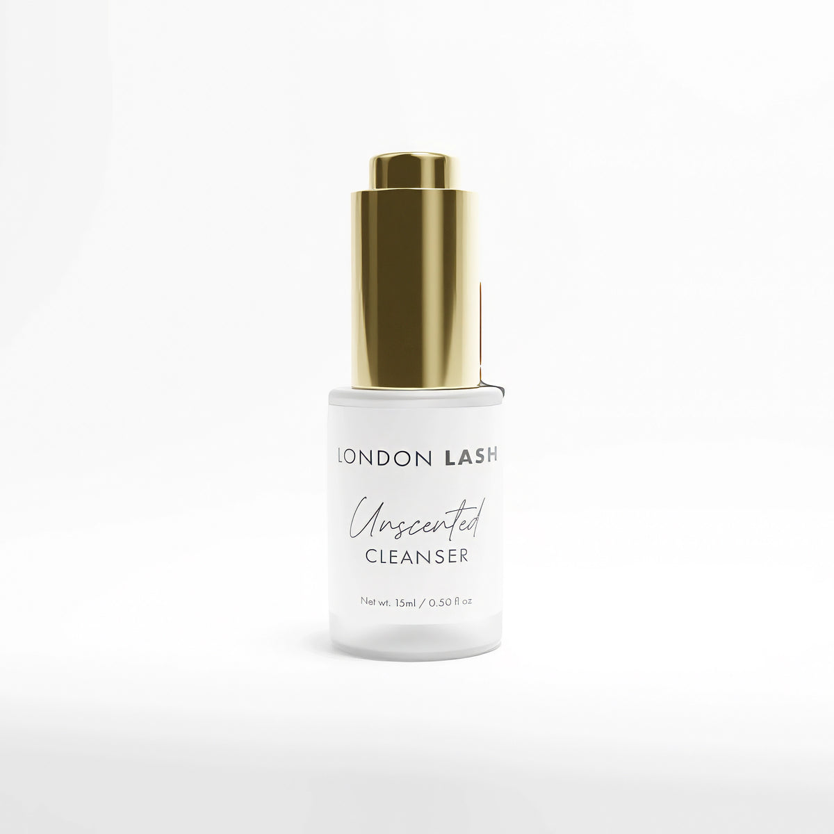 Eyelash cleanser bottle with gold cap on a white background