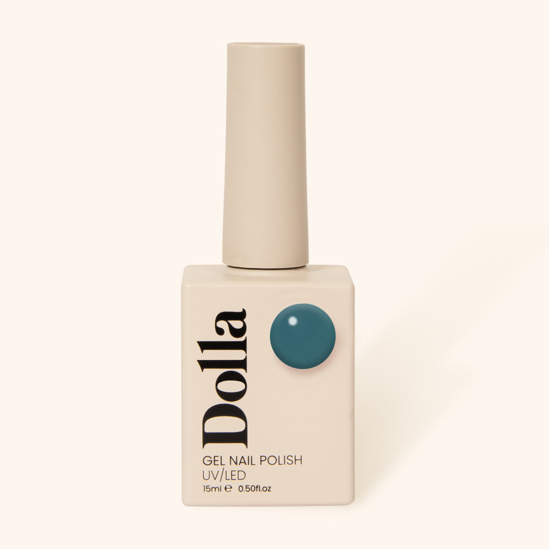 Close-up of 'Midnight' gel nail polish bottle standing upright with cap on