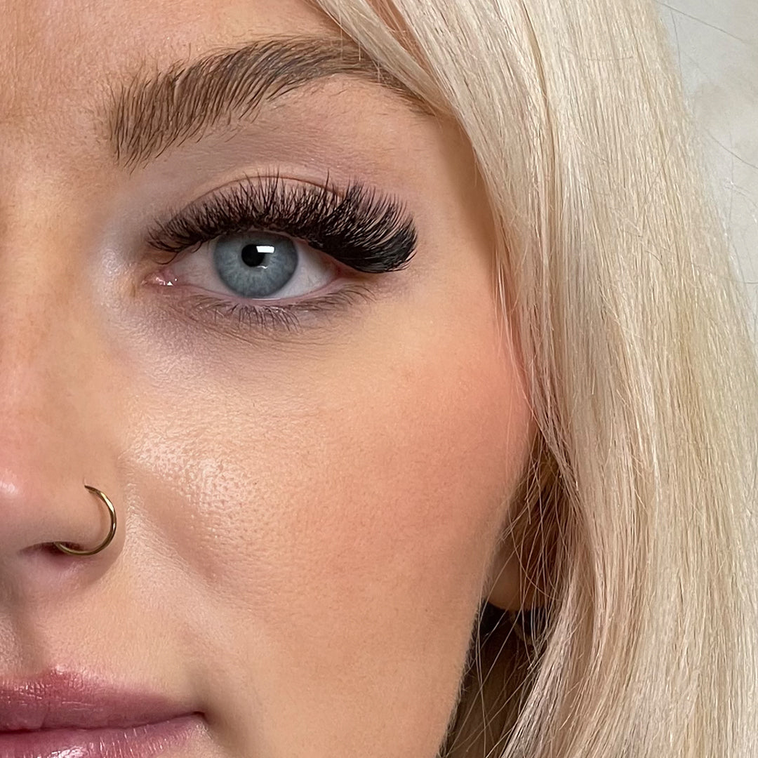 Model wearing London Lash Kensington Lashes 0.07 showing soft satin volume eyelash extension finish