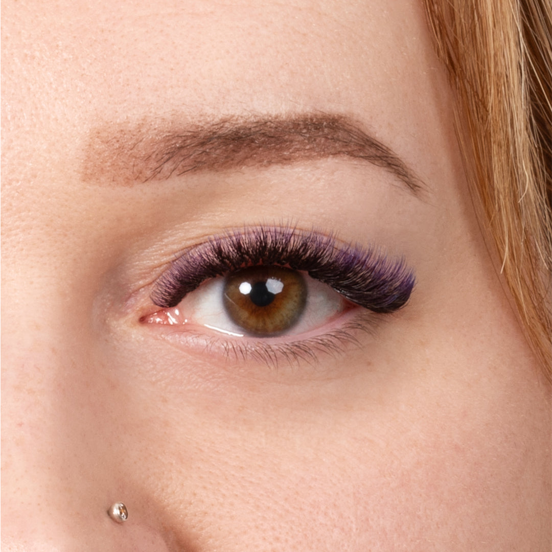 Close up of model wearing London Lash Violet Two-Tone Ombre coloured eyelash extensions showing ombre colour effect