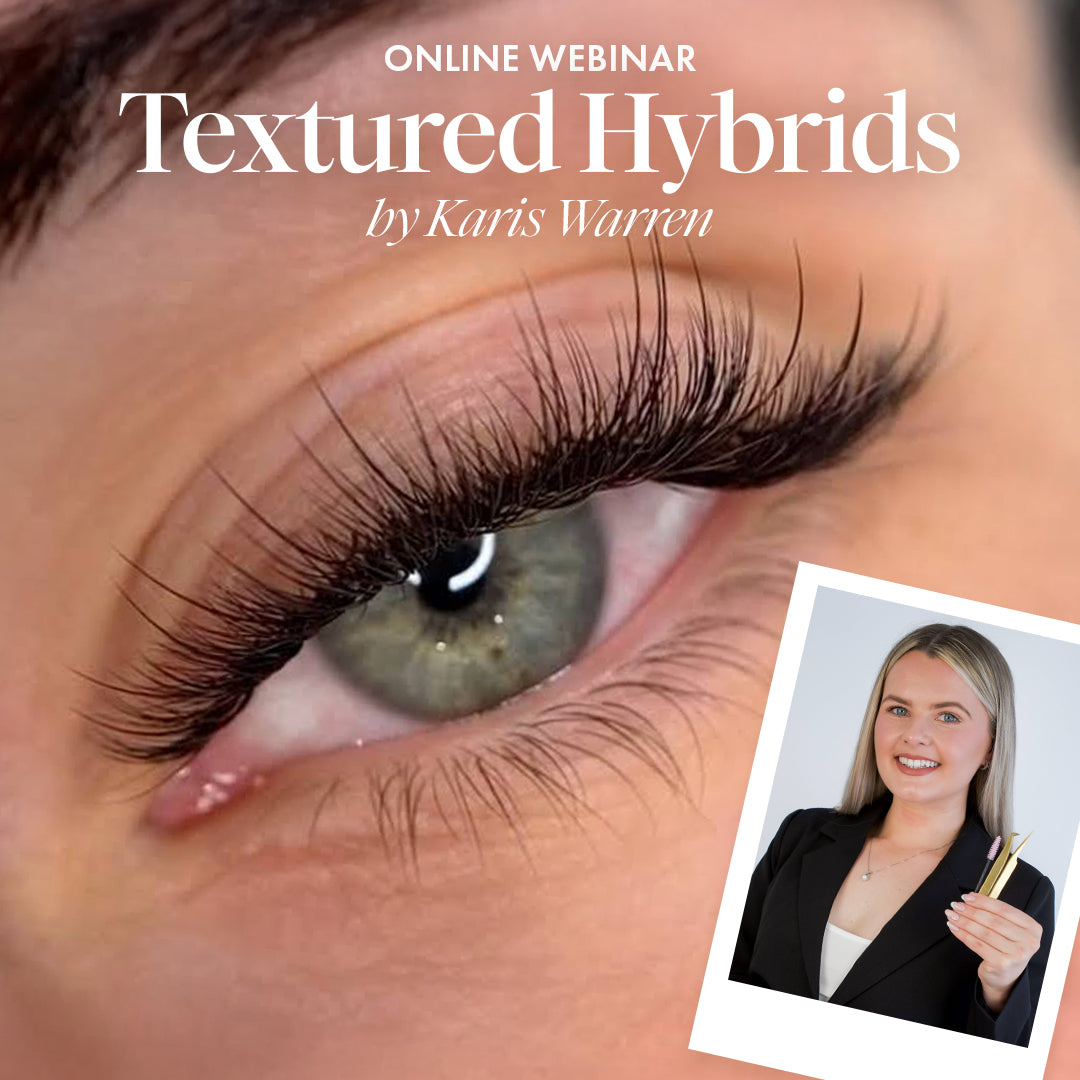 close up of beautiful blue eye with hybrid eyelash extensions