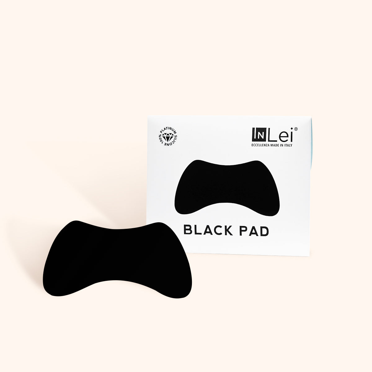 InLei Silicone & Reusable Eye Pads White & Black featuring black pad packaging and product.
