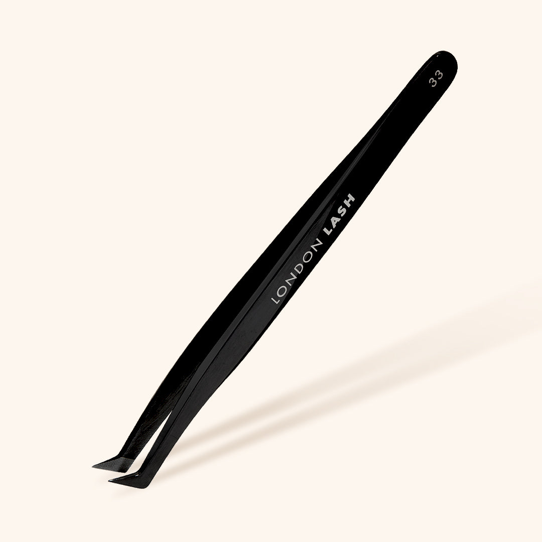 Close-up of Fiber Tip Eyelash Extensions Tweezers for precise lash application